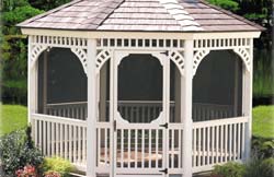 12’ Octagon Victorian No5 white vinyl gazebo with 2” x 2” balusters, chestnut brown rubber slate roof, brown composite flooring.